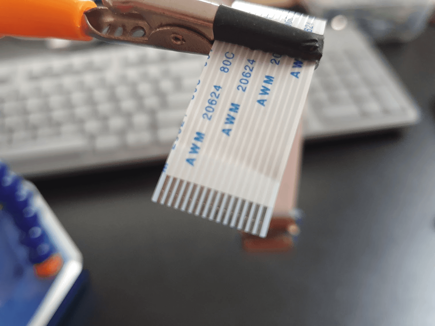 The 'pins' are exposed on one side of the CSI cable